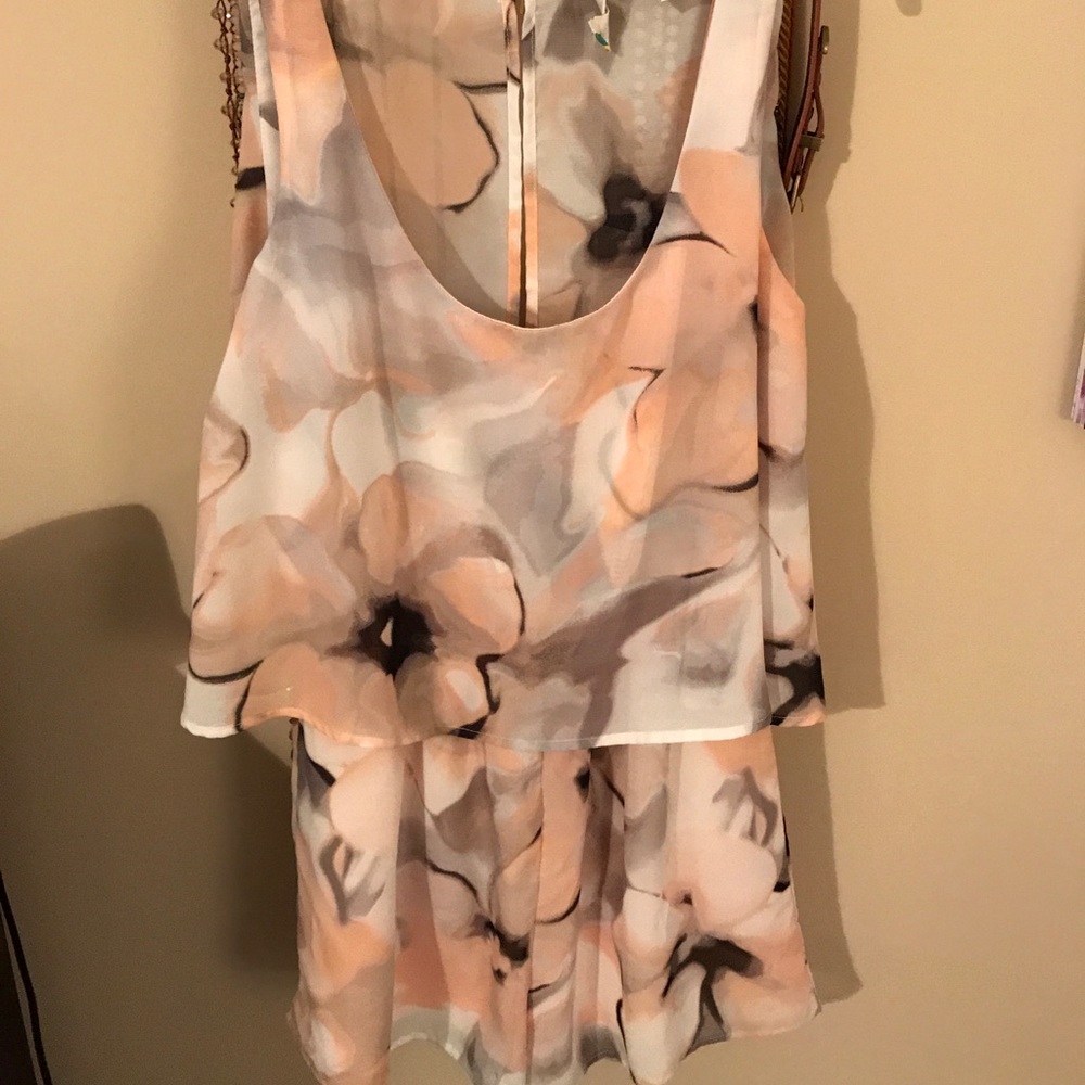Pink and black sheer romper